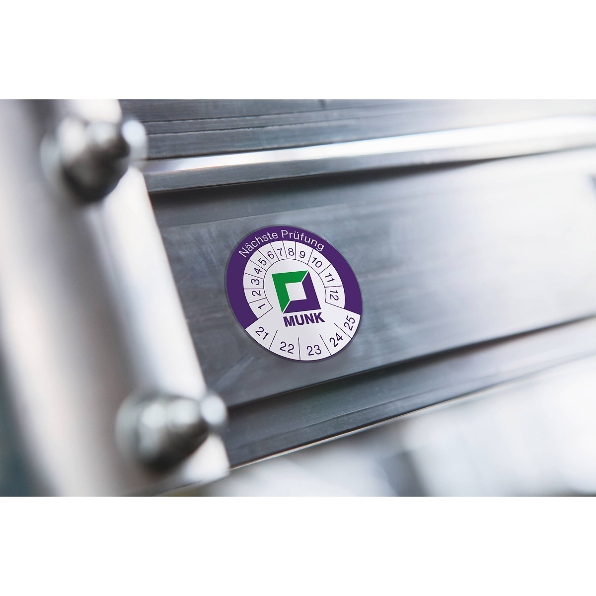 Munk Prüfplakette